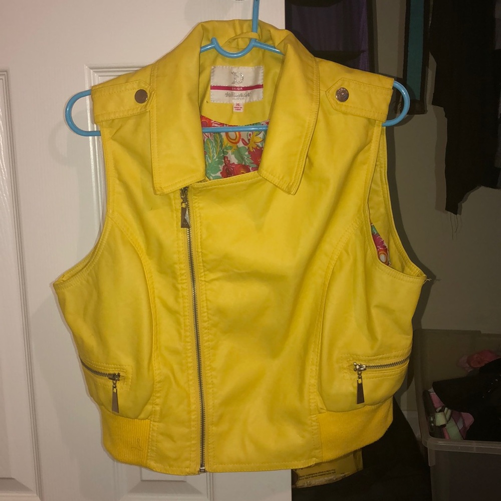 Yellow kinda jacket vest like
